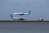 1 in 3 SFO flights arrived late in June. Relief could be in sight